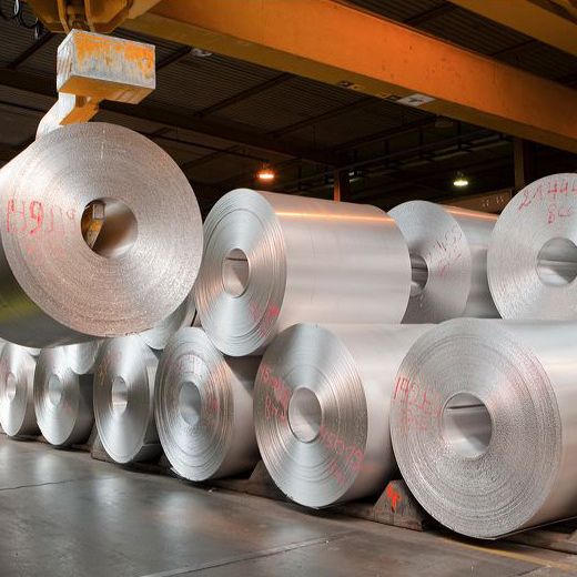 big aluminium rolls with worker