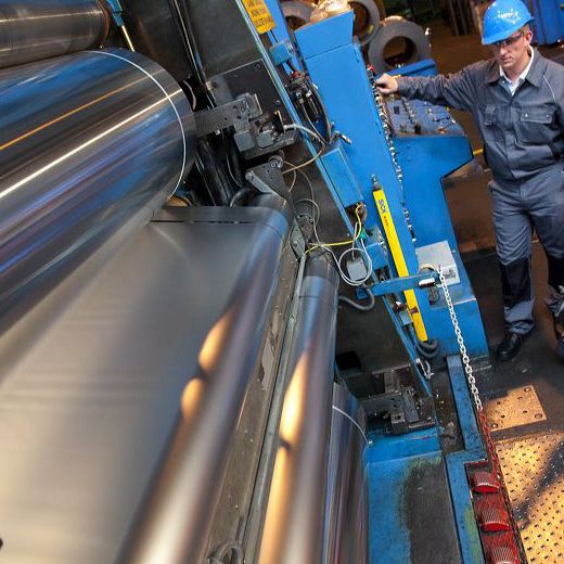 Aluminium foil production with workers