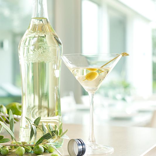 liquor bottle witch cocktail glas and screw cap
