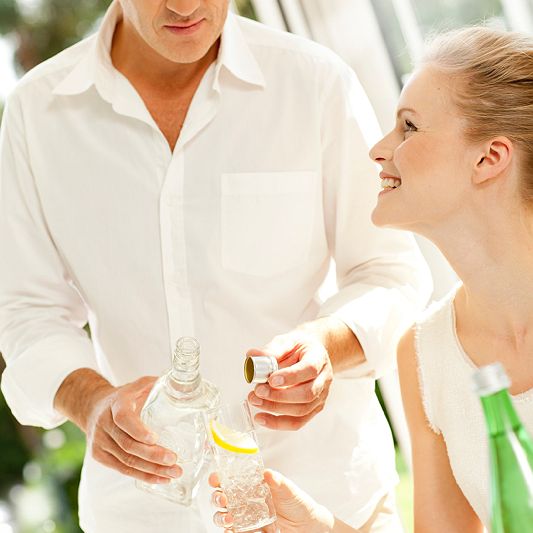 man and woman with water bottle