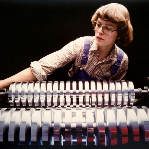 Woman at aluminium foil production
